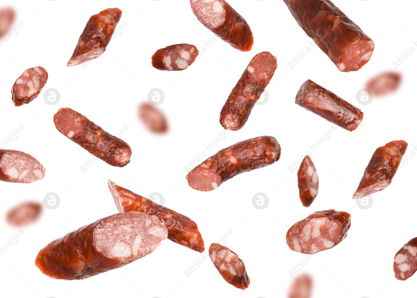 Image of Dry smoked sausage pieces in air on white background, collage