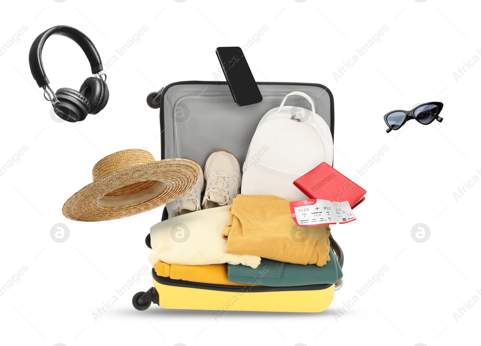 Image of Suitcase with clothes and other flying items on white background. Ready to travel