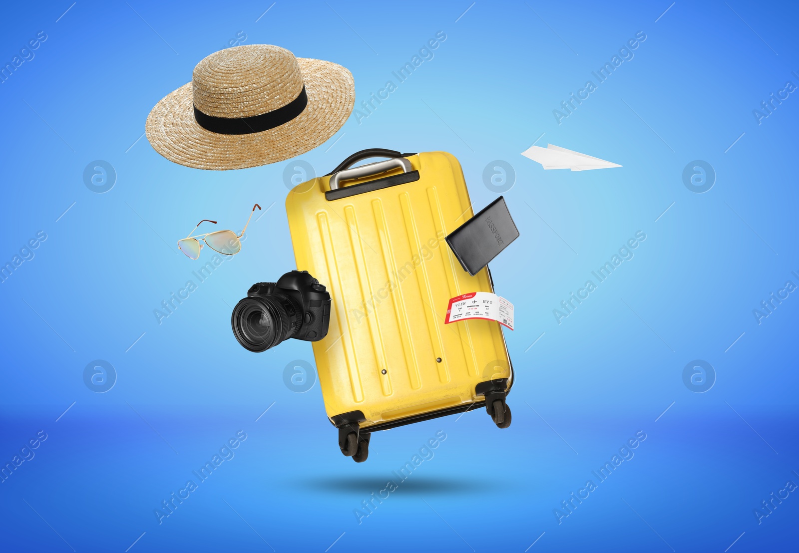 Image of Suitcase, passport, ticket, sunglasses, hat, camera and paper plane in air on blue background. Ready to travel