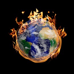 Image of Planet Earth on fire against black background. Conceptual image for global warming. Image elements furnished by NASA