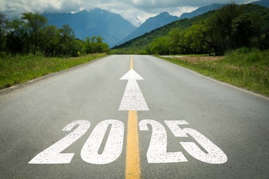 Image of 2025 and arrow on asphalt road. Concept of new year, fresh beginning