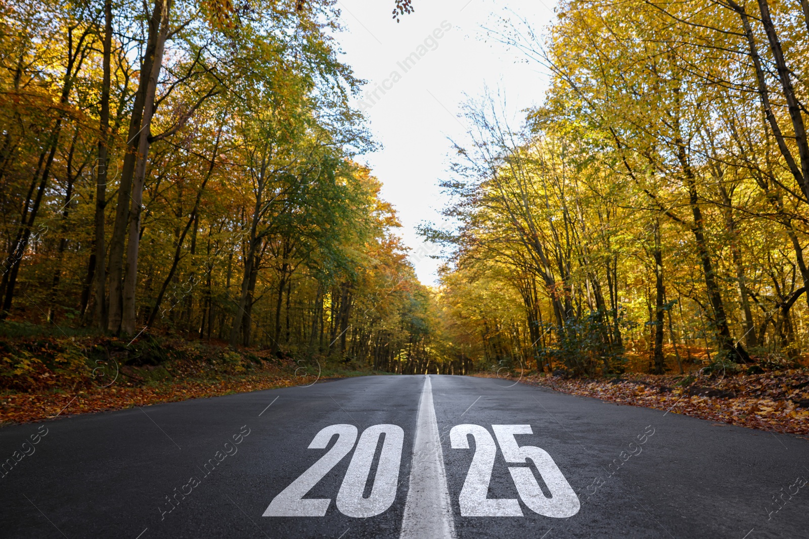 Image of 2025 on asphalt road. Concept of new year, fresh beginning