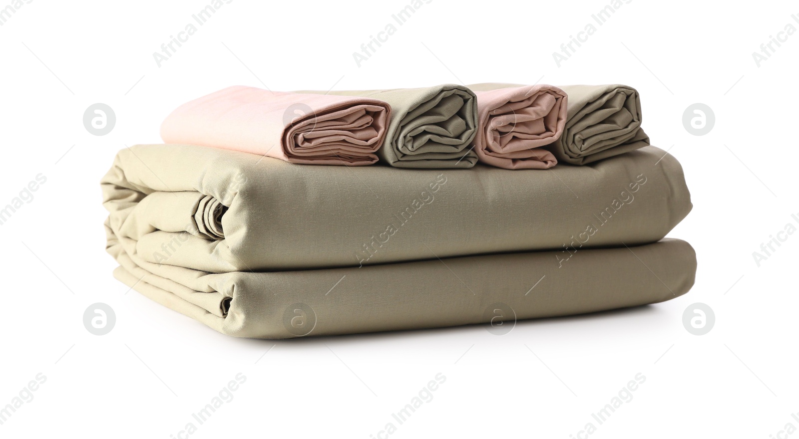 Photo of Stack of clean bed sheets isolated on white