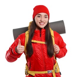 Smiling young woman with backpack showing thumb up on white background. Active tourism