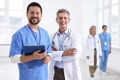 Photo of Healthcare workers in hospital, selective focus. Medical service