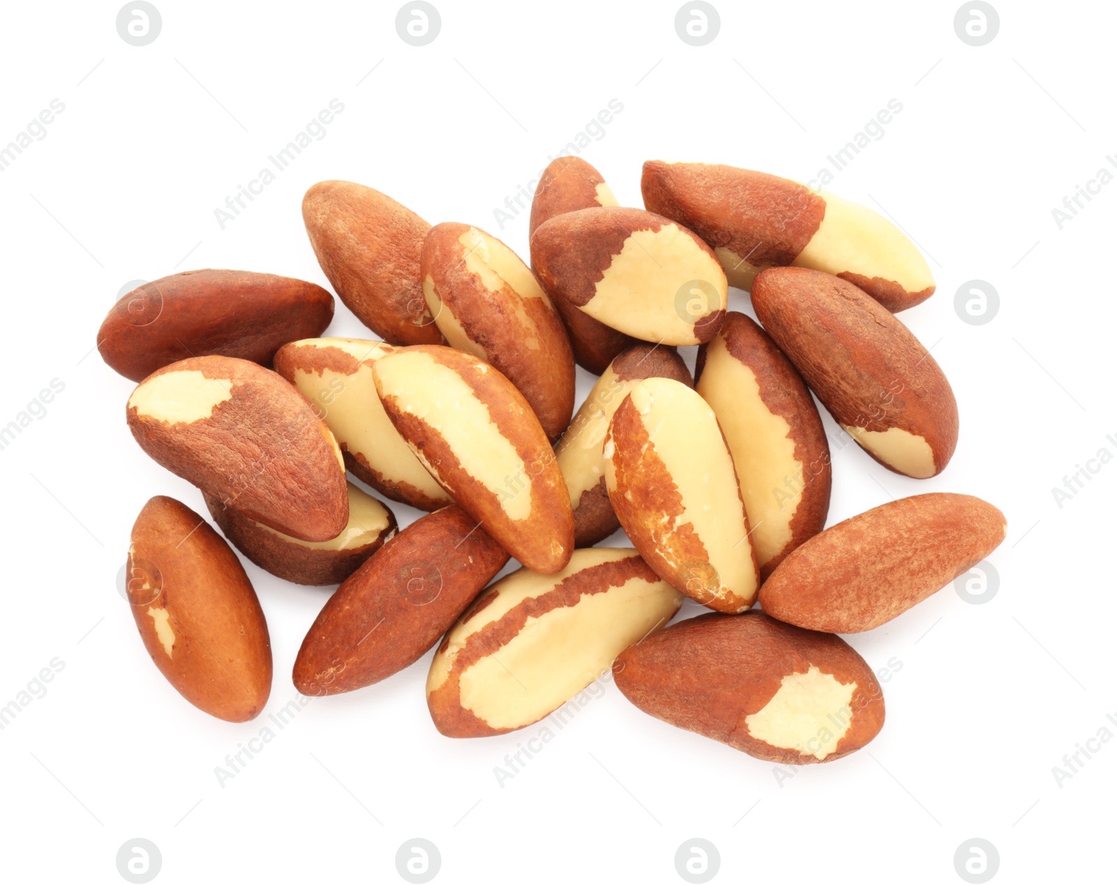 Photo of Heap of Brazil nuts isolated on white, top view