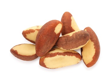 Photo of Heap of Brazil nuts isolated on white, top view