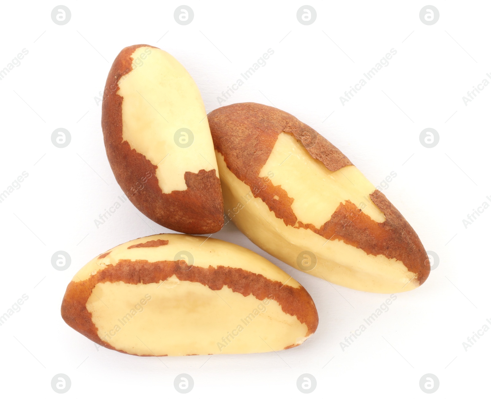 Photo of Tasty Brazil nuts isolated on white, top view