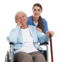 Caregiver assisting senior woman in wheelchair on white background. Home health care service