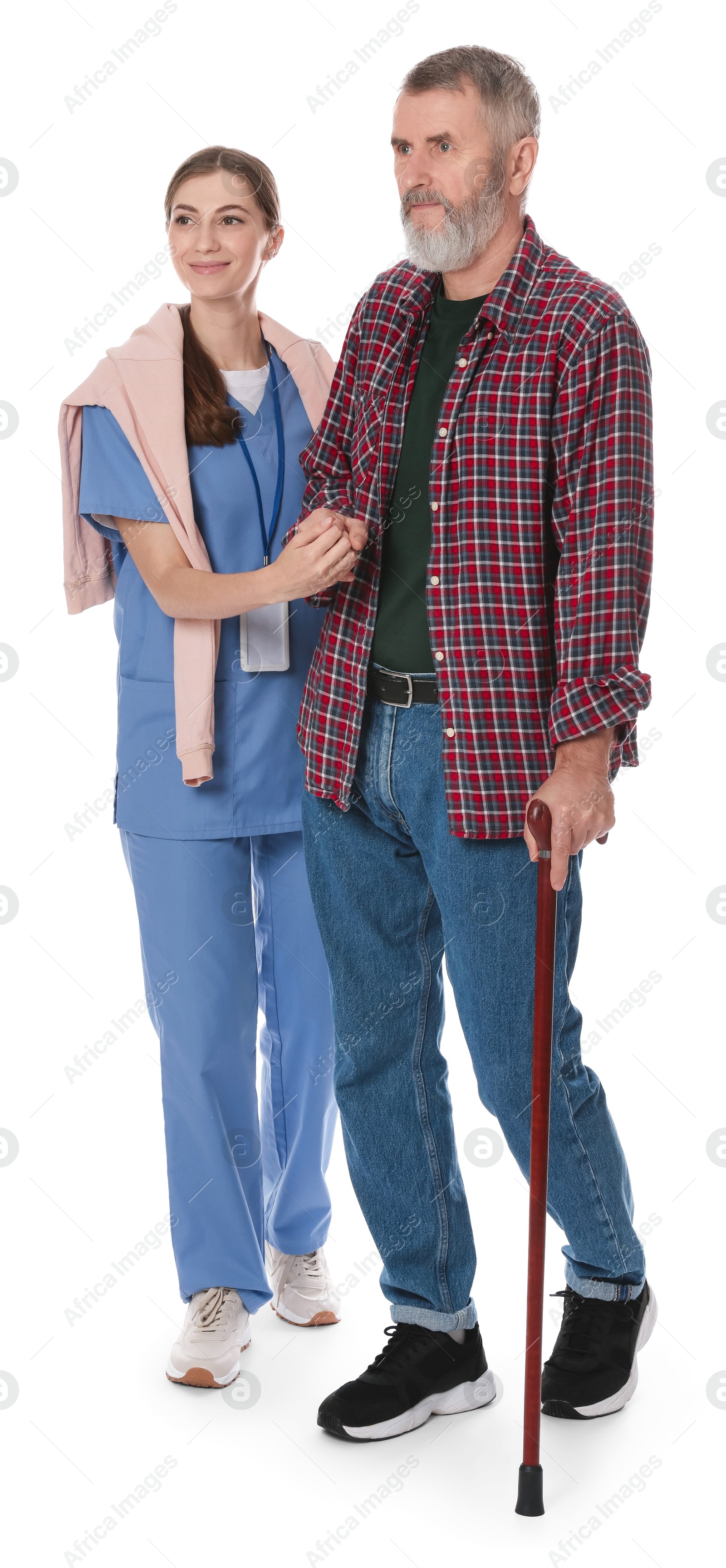 Photo of Caregiver supporting senior man with walking cane on white background. Home health care service