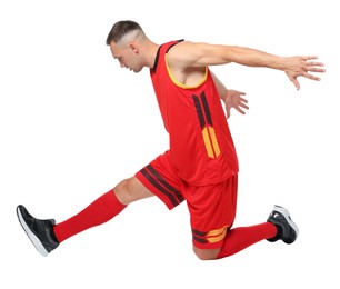 Photo of Football player in sportswear training on white background