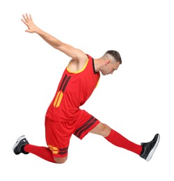 Photo of Football player in sportswear training on white background