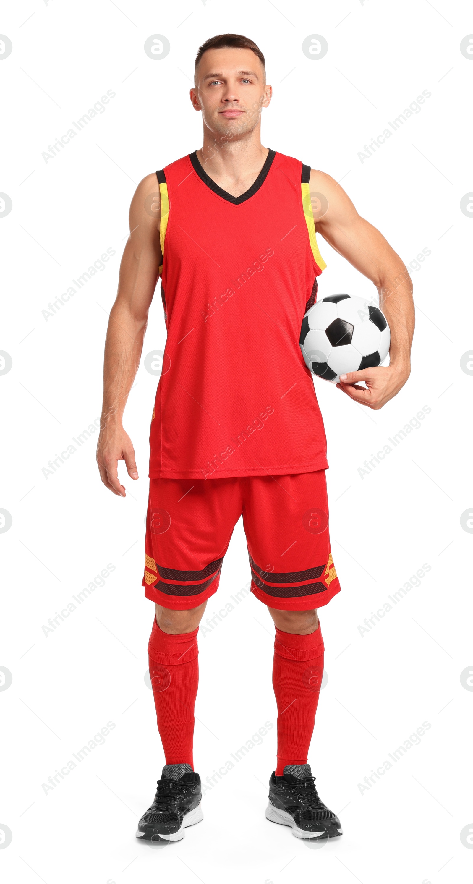 Photo of Football player with soccer ball on white background