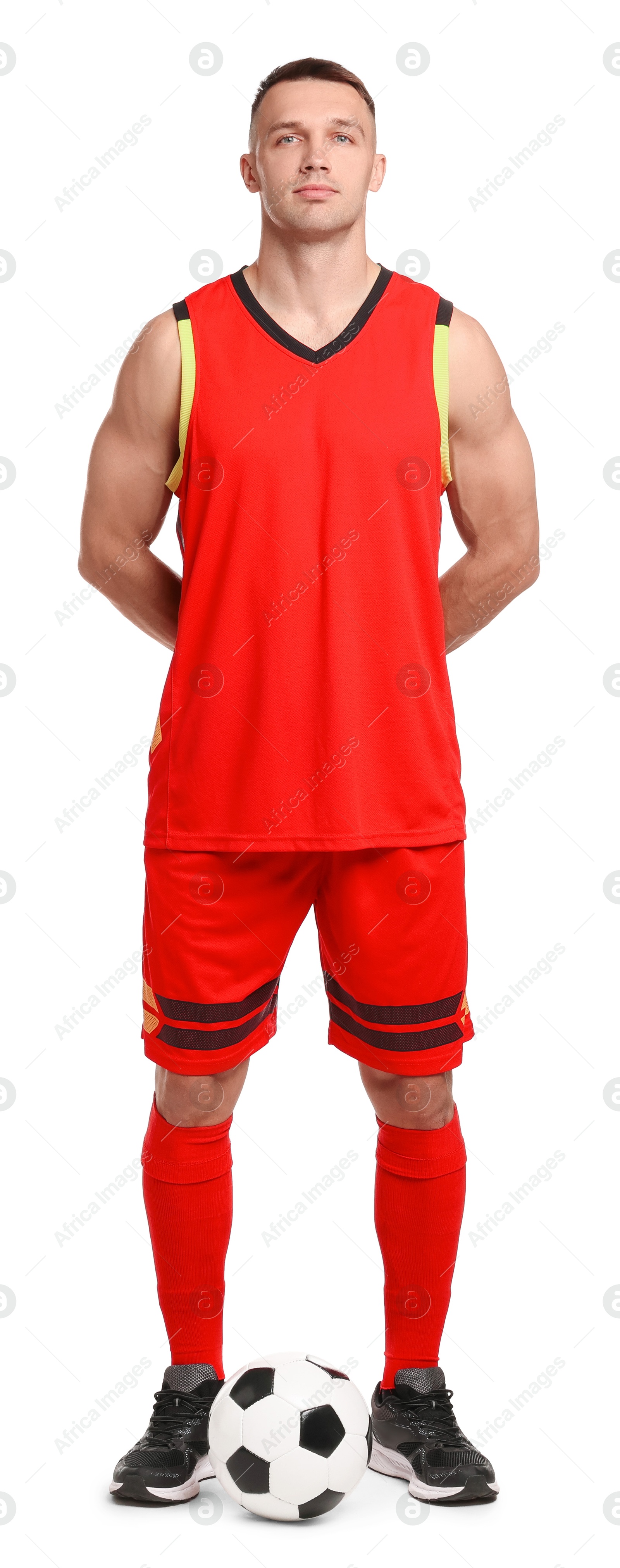 Photo of Football player with soccer ball on white background