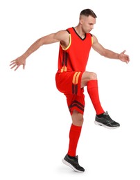 Football player in sportswear training on white background