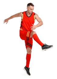 Football player in sportswear training on white background