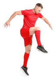 Football player in sportswear training on white background