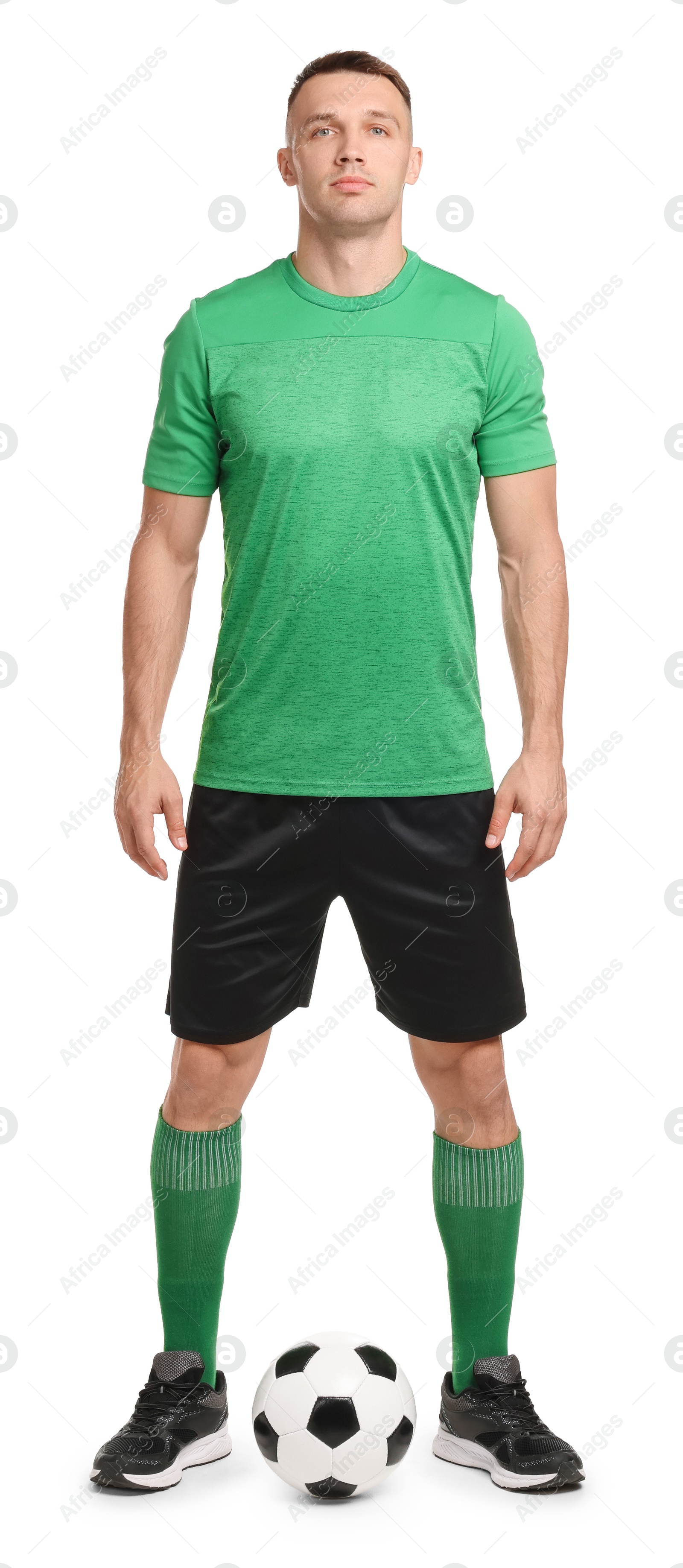 Photo of Football player with soccer ball on white background