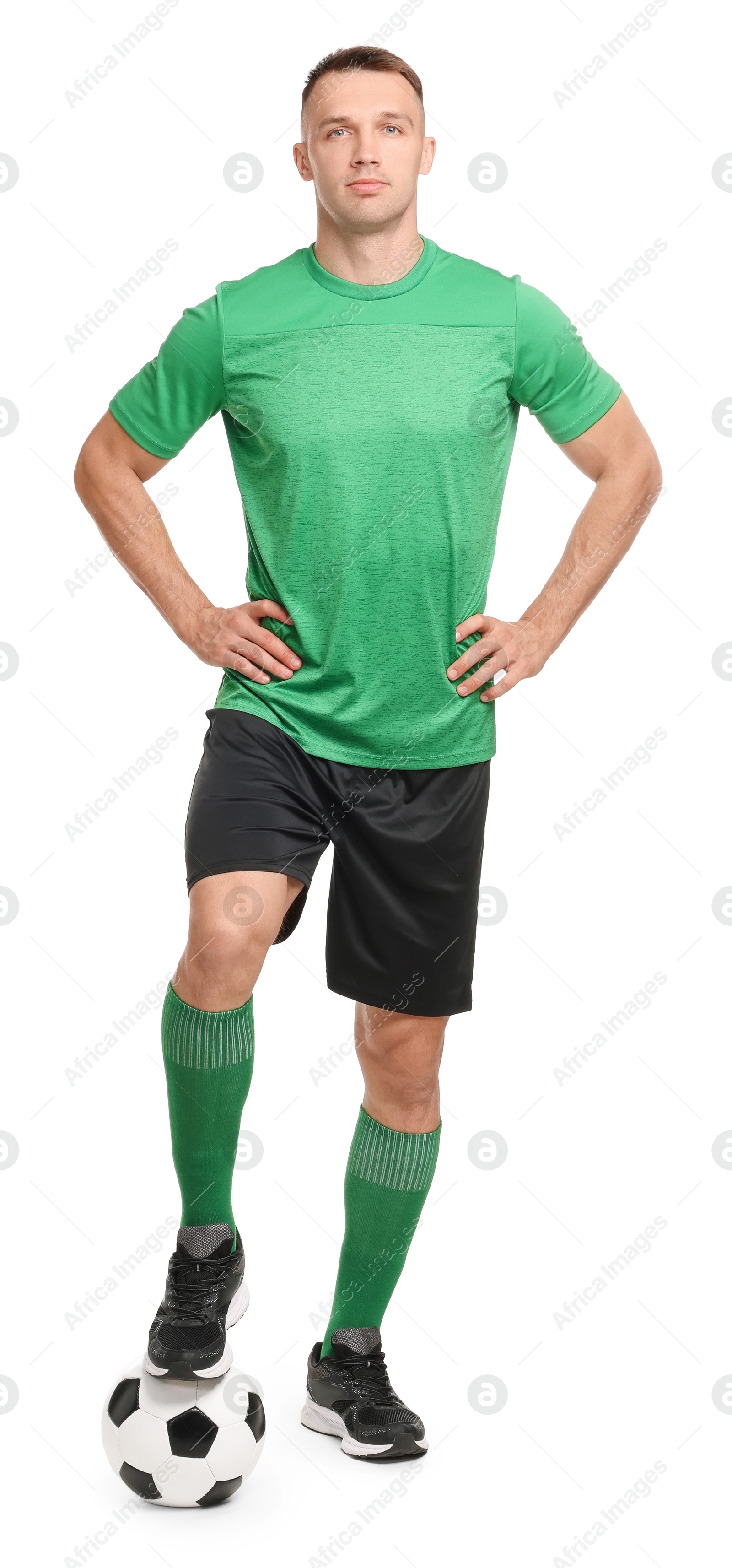 Photo of Football player with soccer ball on white background