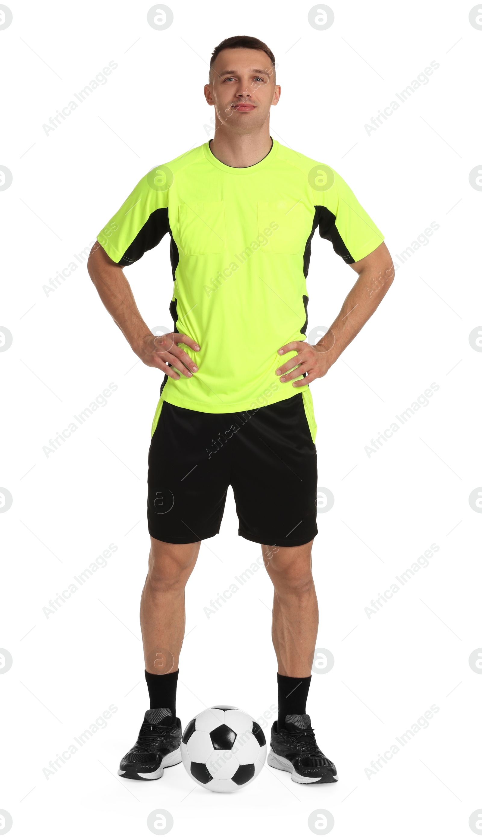 Photo of Football player with soccer ball on white background