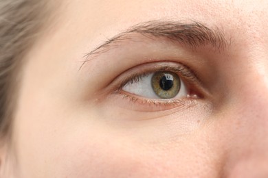 Photo of Closeup view of young woman with beautiful eyes