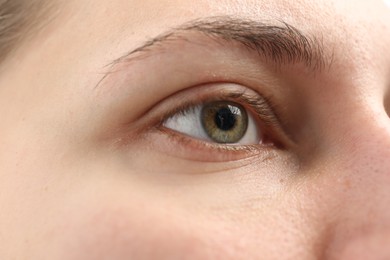 Photo of Closeup view of young woman with beautiful eyes