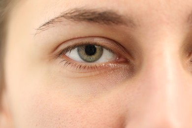 Photo of Macro view of young woman with beautiful eyes