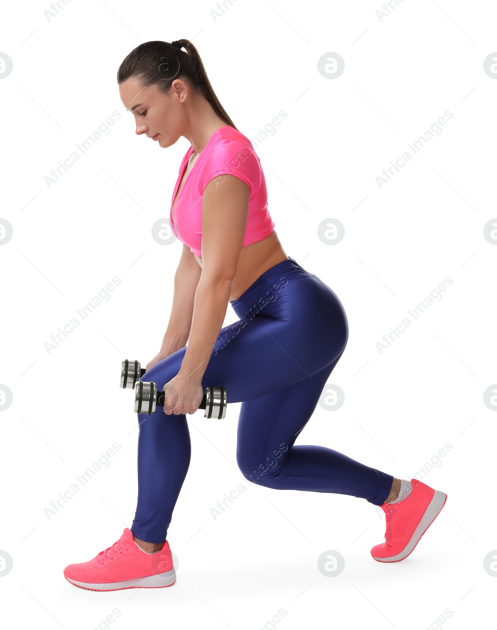 Photo of Woman exercising with dumbbells on white background