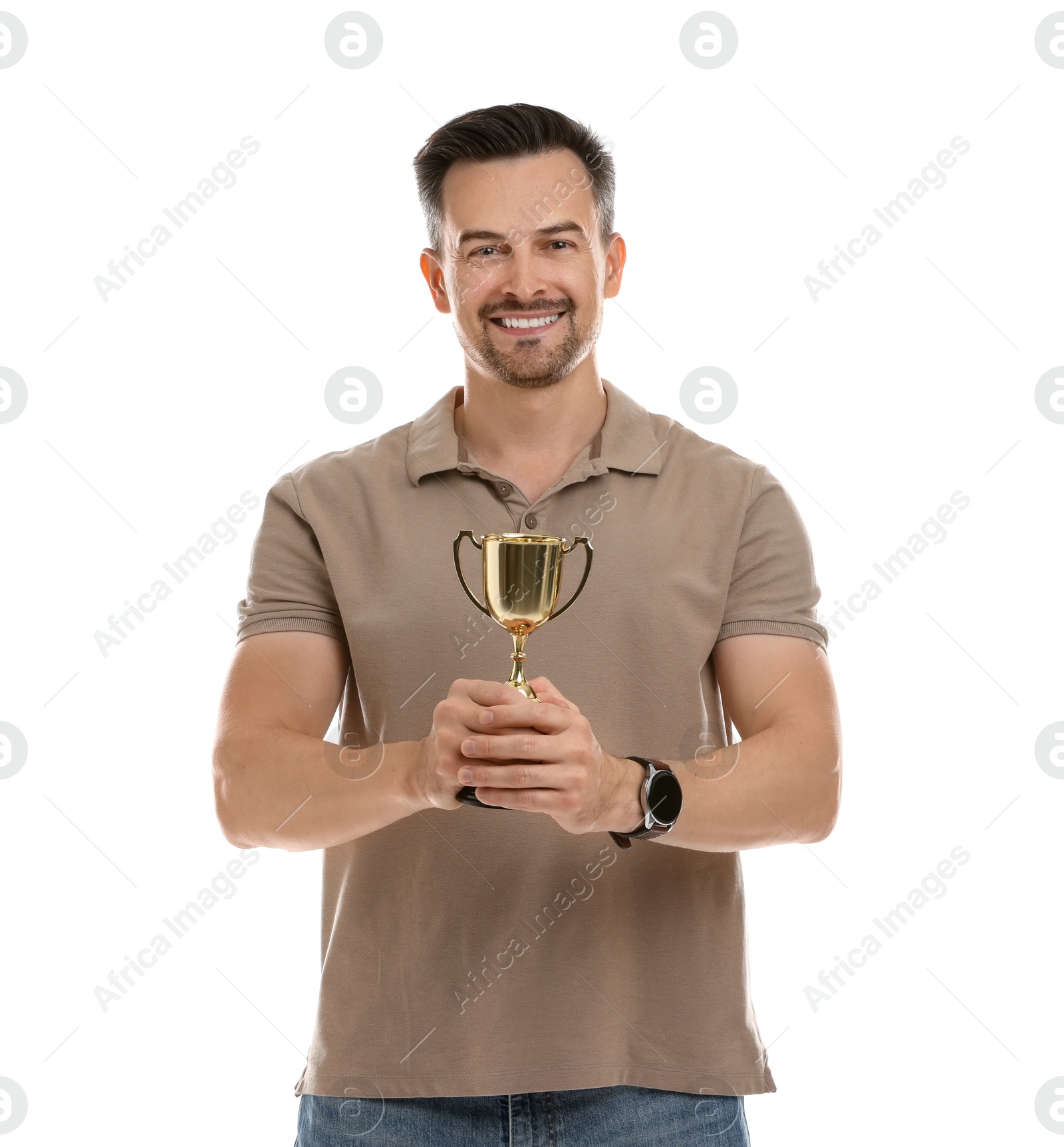 Photo of Happy winner with golden trophy cup on white background