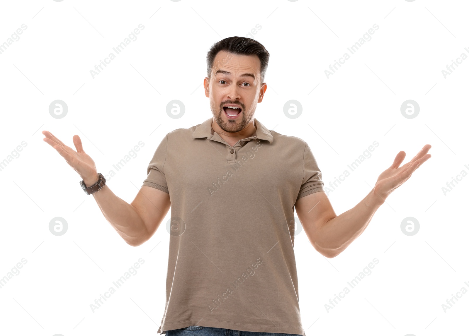 Photo of Portrait of surprised winner on white background