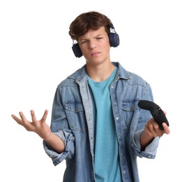 Teenage boy in headphones with controller on white background