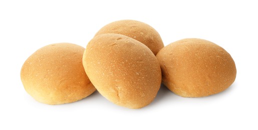 Photo of Many fresh tasty buns isolated on white