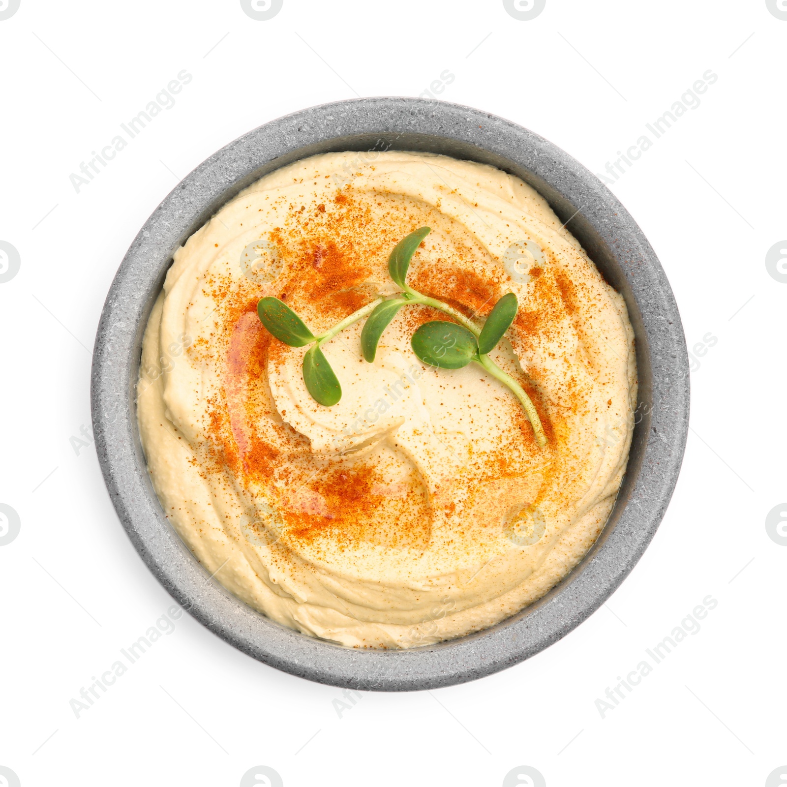 Photo of Delicious hummus with paprika isolated on white, top view