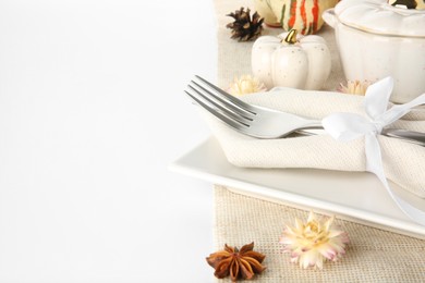 Photo of Beautiful table setting with autumnal decor on white background