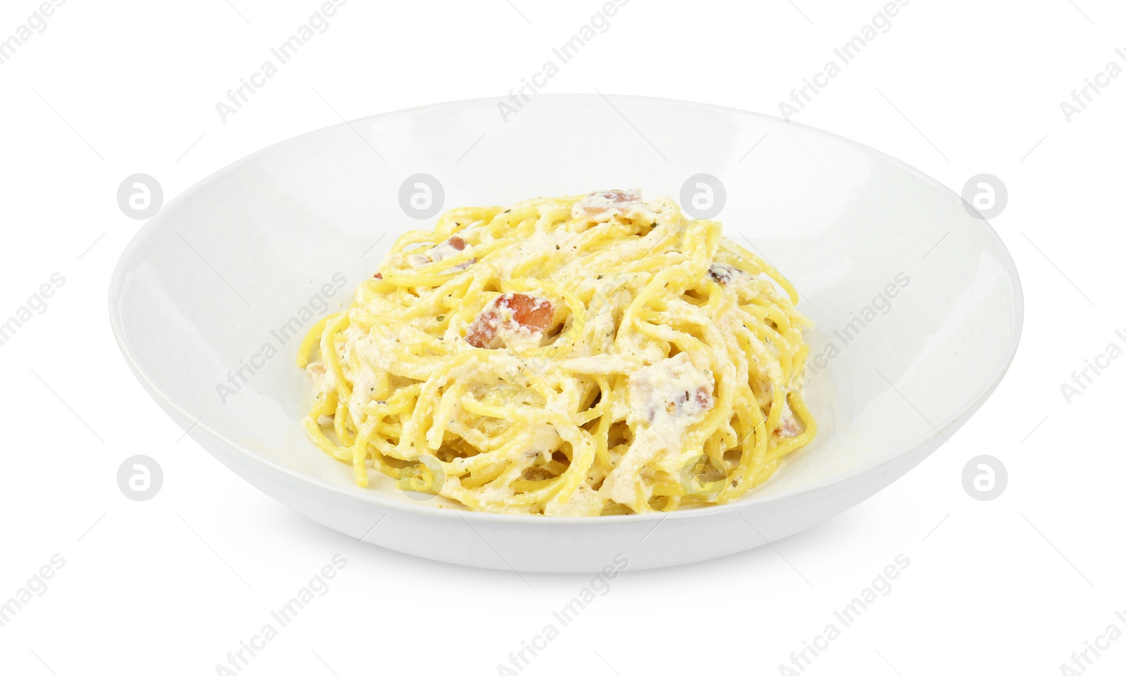 Photo of Delicious pasta Carbonara in bowl isolated on white