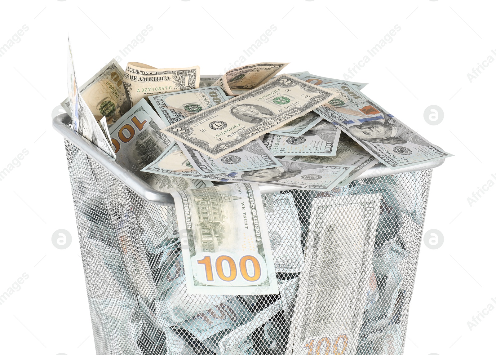 Photo of Many dollar banknotes in trash bin isolated on white