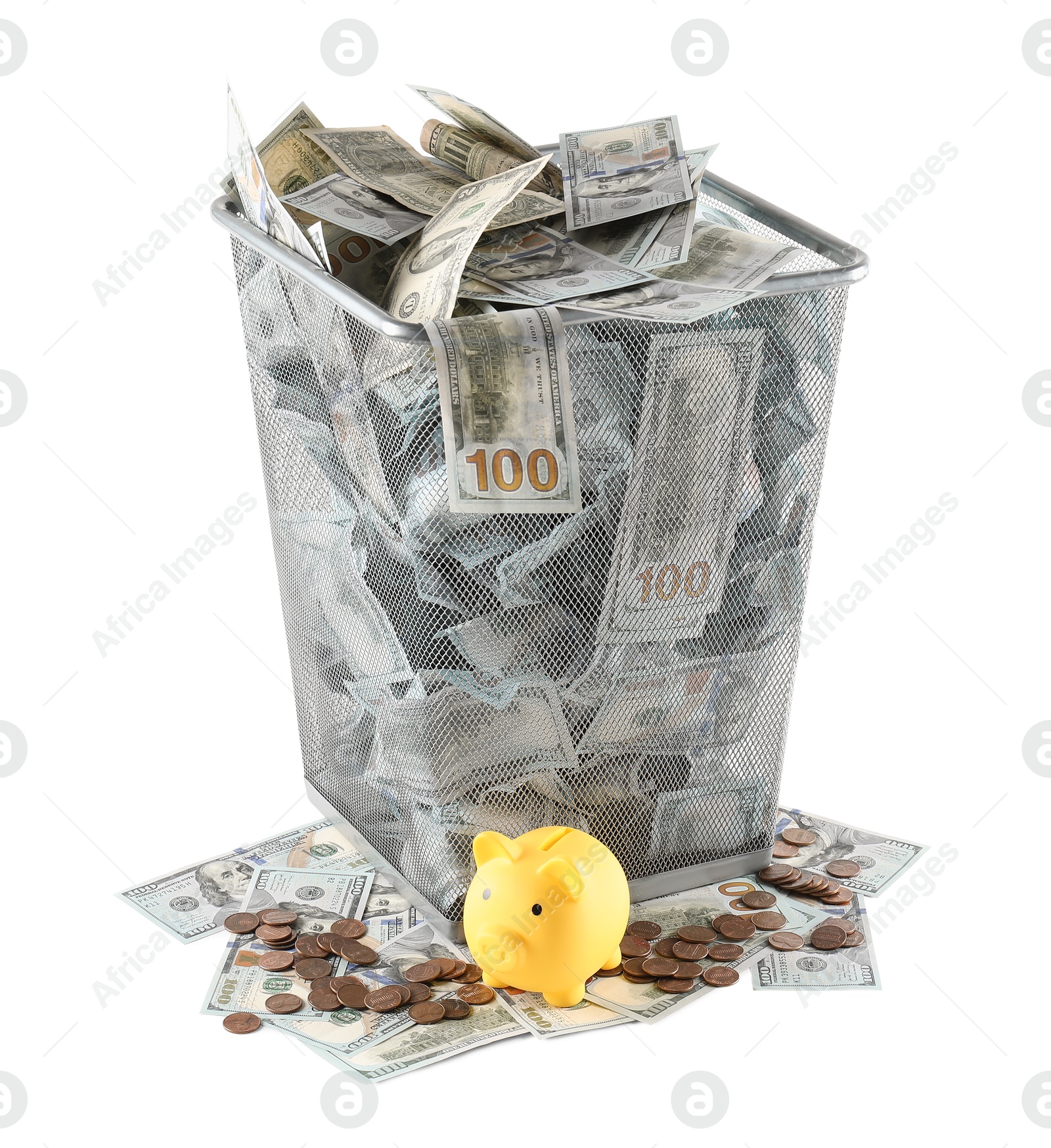 Photo of Many dollar banknotes in trash bin, coins and piggy bank isolated on white