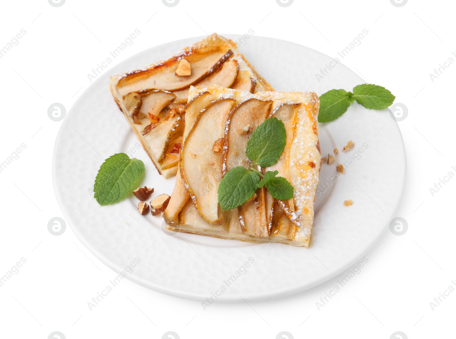 Photo of Pieces of tasty puff pastry pie with pears and mint isolated on white