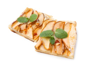 Photo of Pieces of tasty puff pastry pie with pears and mint isolated on white