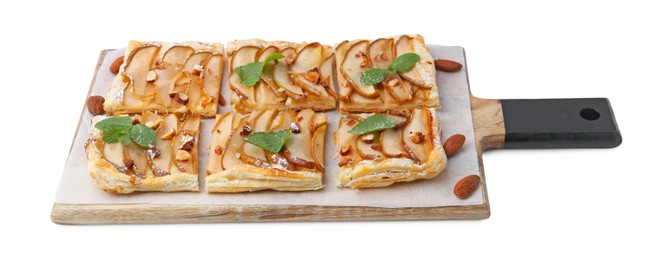 Photo of Pieces of tasty puff pastry pie with pears, mint and almonds isolated on white