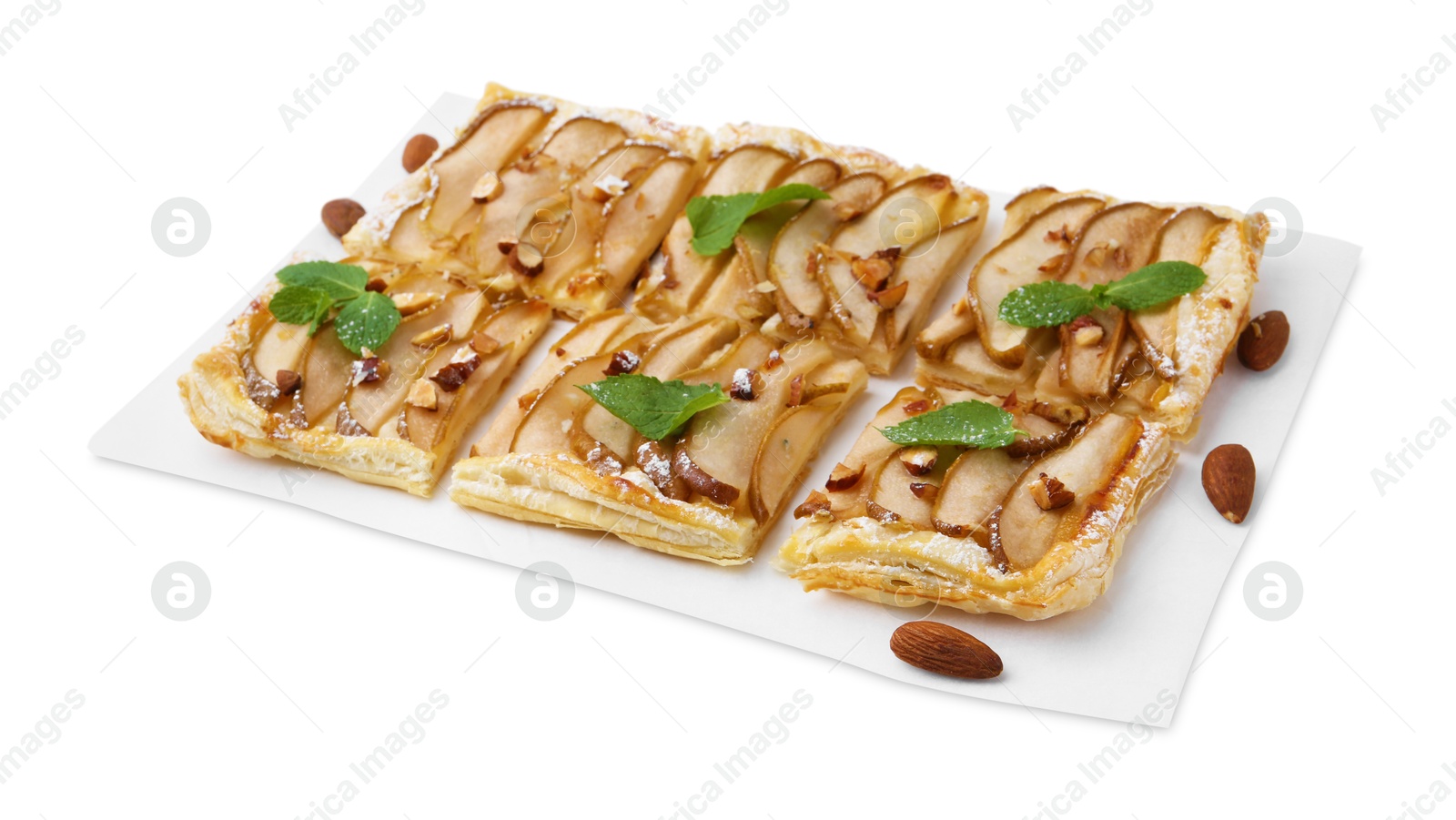 Photo of Pieces of tasty puff pastry pie with pears, mint and almonds isolated on white