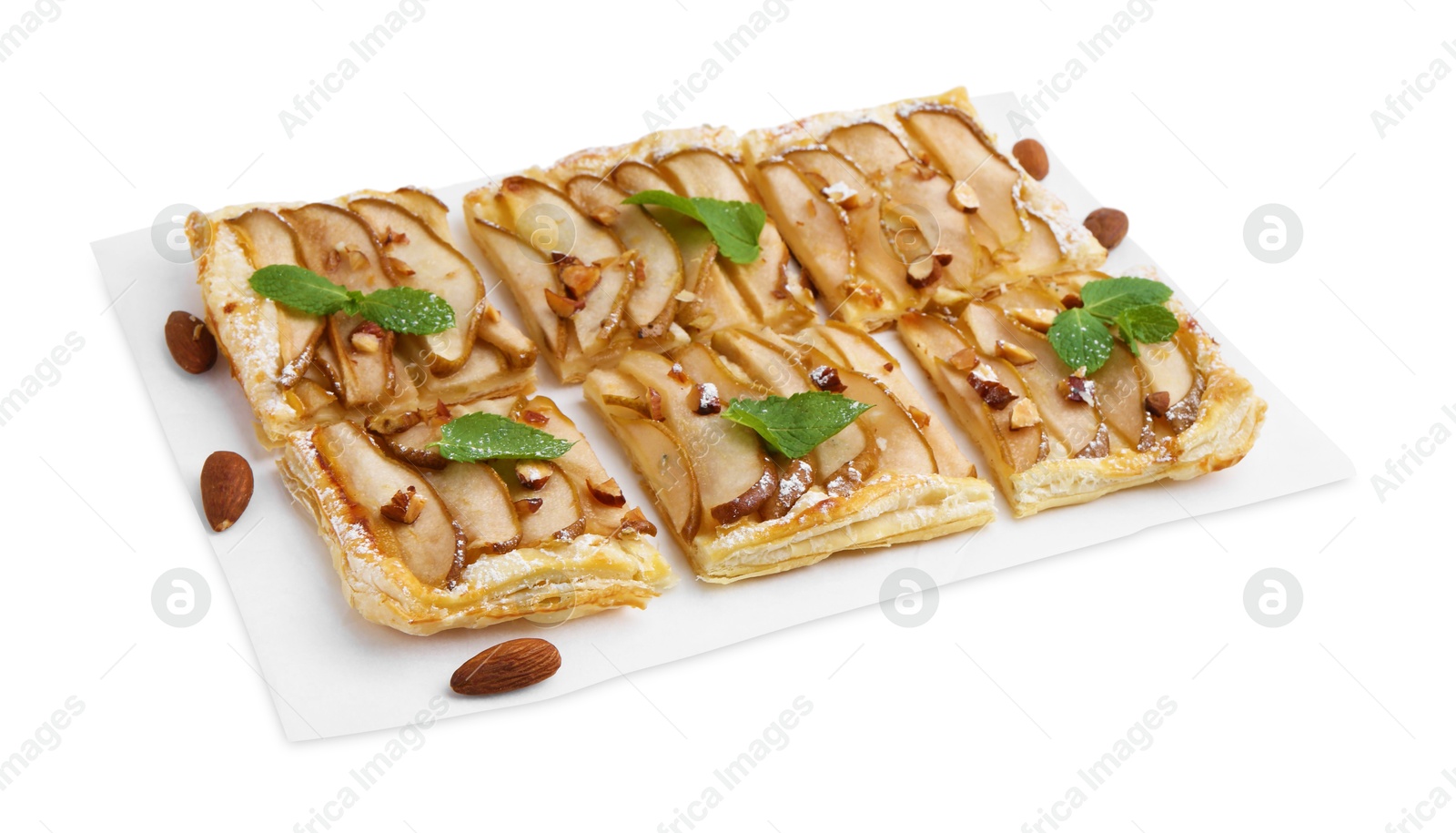 Photo of Pieces of tasty puff pastry pie with pears, mint and almonds isolated on white