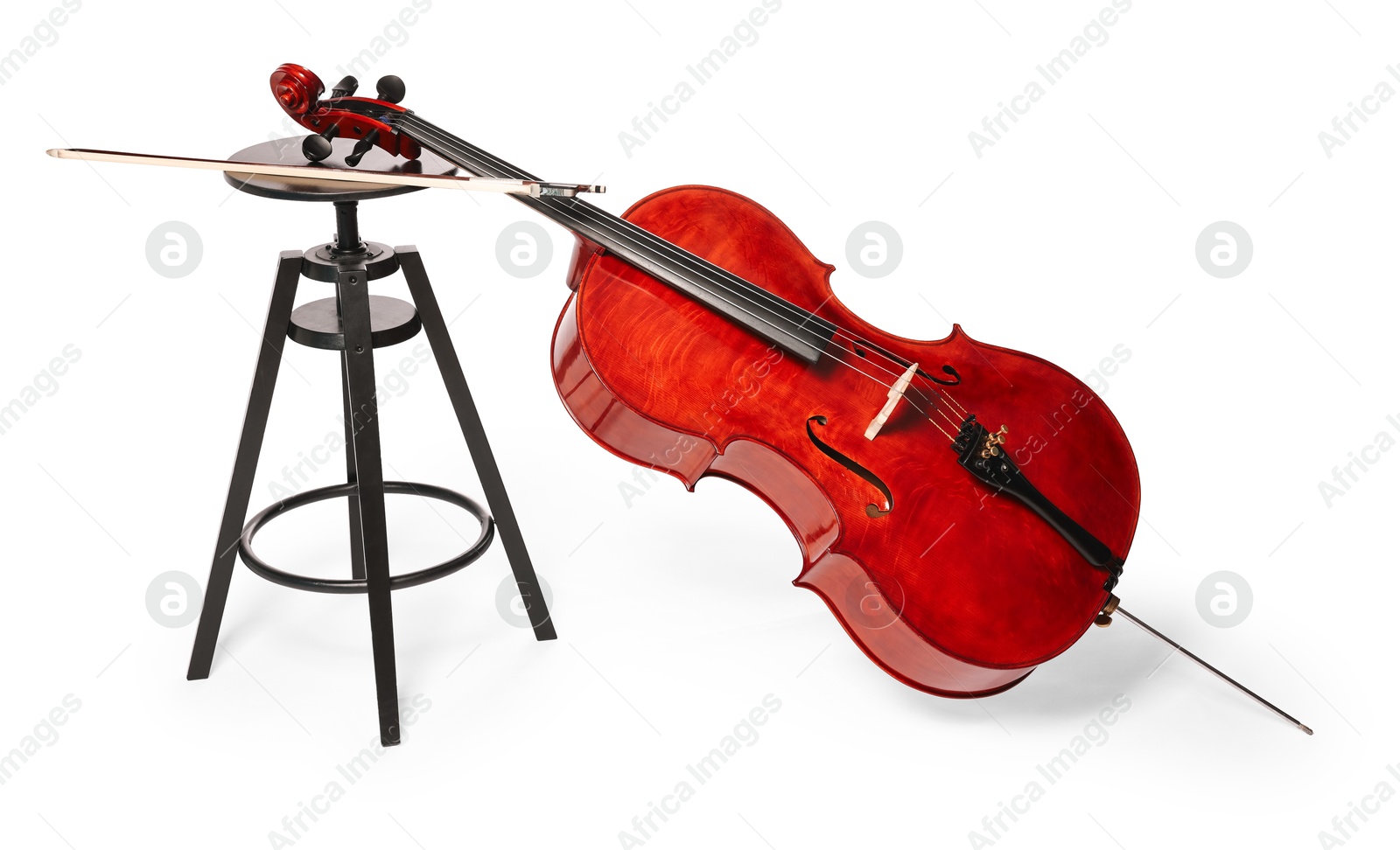 Photo of Beautiful cello and stool isolated on white. Classic musical instrument