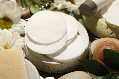 Photo of Composition with cotton pads on table, closeup