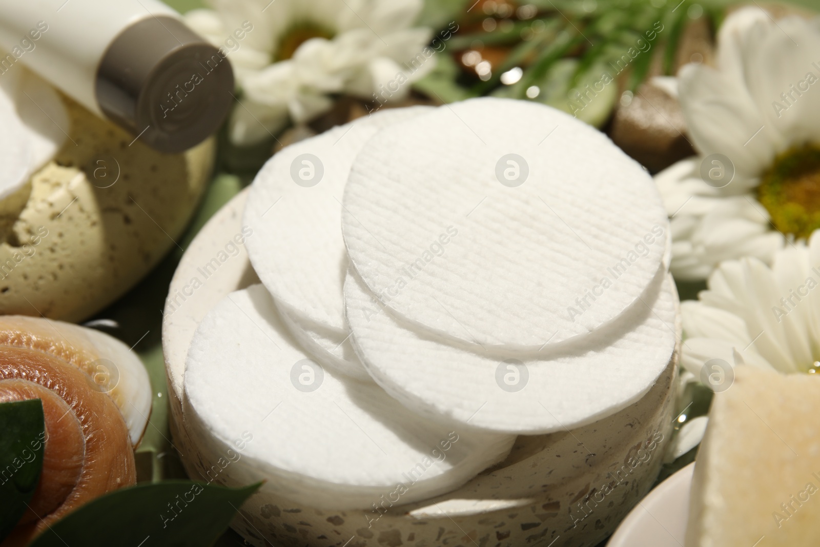 Photo of Composition with cotton pads on table, closeup