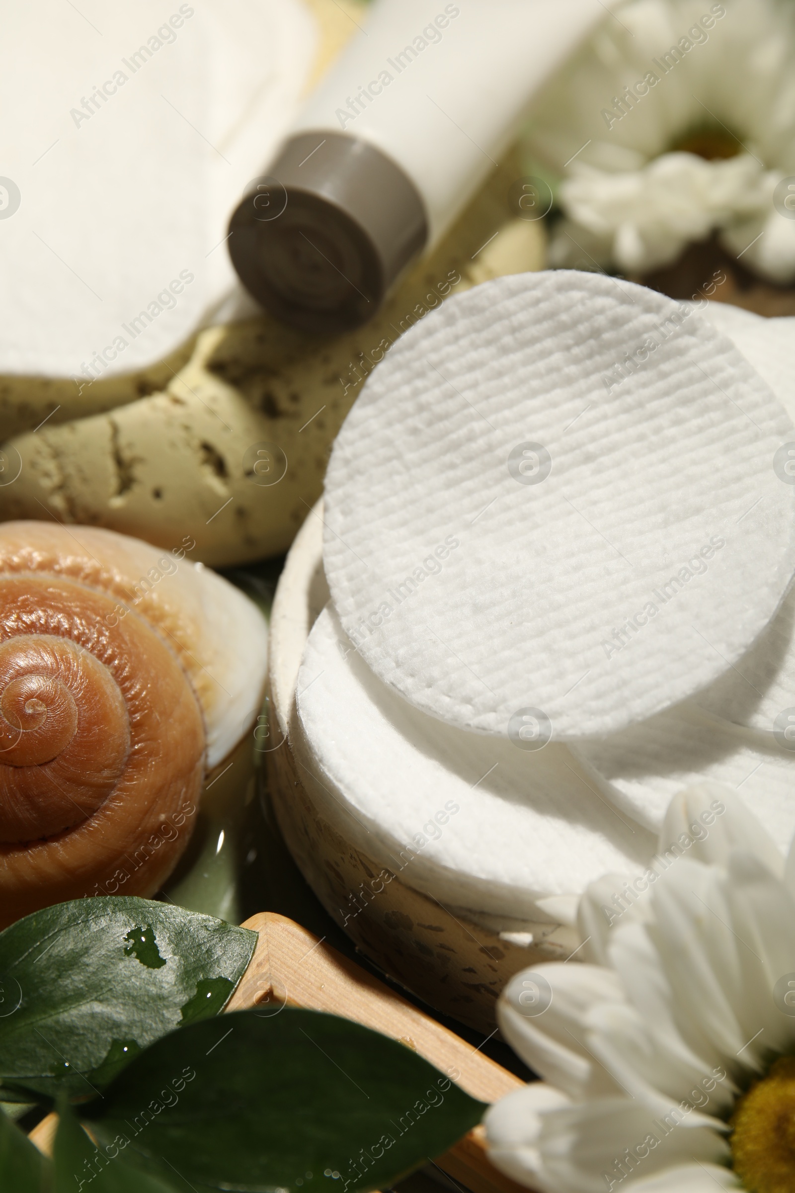 Photo of Composition with cotton pads on table, closeup