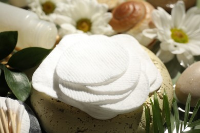 Photo of Composition with cotton pads on table, closeup