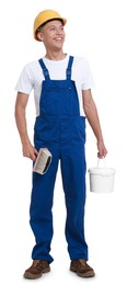 Young decorator with paint brush and bucket on white background