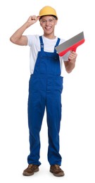 Young decorator with putty knife on white background