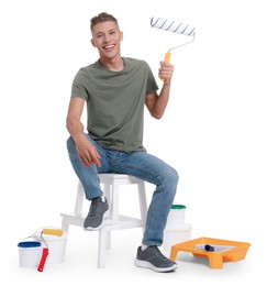 Young decorator with different tools on white background